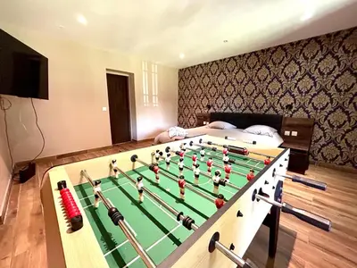 Salle de jeux dans l'établissement Un moment hors du temps - Jacuzzi - Billard -Baby-Foot- Parking - 167