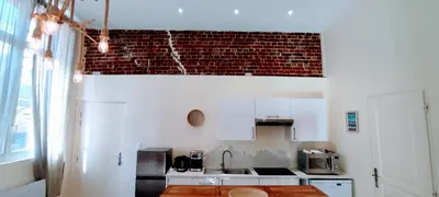 Cuisine ou kitchenette dans l'établissement 5 Spacieux, chaleureux, hyper centre 300m de la mer