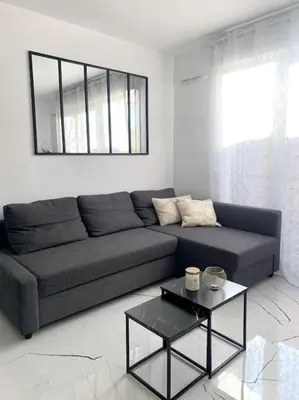 Coin salon dans l'établissement Grand F3 à 30mn de Paris - Terrasse + Parking privé