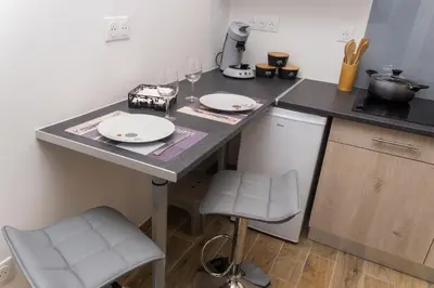 Cuisine ou kitchenette dans l'établissement La Mad Experience