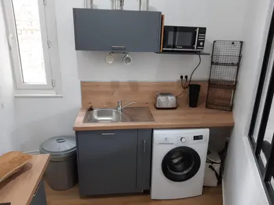 Cuisine ou kitchenette dans l'établissement Amiens magnifique appartement Frida