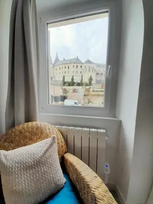 Un ou plusieurs lits dans un hébergement de l'établissement Côté Château