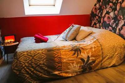 Un ou plusieurs lits dans un hébergement de l'établissement ROMANTIC STUDIO EVE - PROCHE GARE - NETFLIX - WiFi