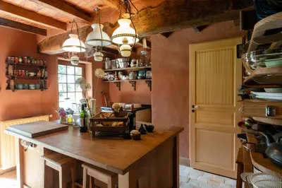 Cuisine ou kitchenette dans l'établissement Cottage les forières