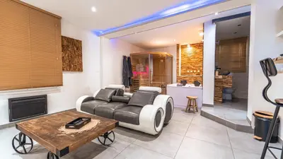 Coin salon dans l'établissement Wood 47 spa