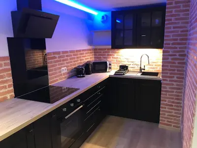 Cuisine ou kitchenette dans l'établissement Le Jacuzzi