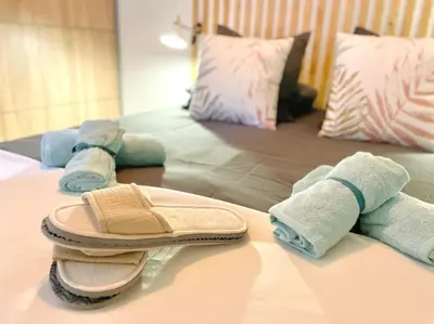 Un ou plusieurs lits dans un hébergement de l'établissement La Suite ALOHA, Elegant & Cosy