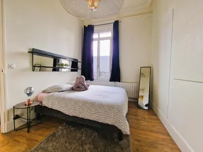 Un ou plusieurs lits dans un hébergement de l'établissement Le Fontenelle Appartement hyper centre par beds76