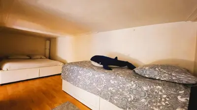 Un ou plusieurs lits dans un hébergement de l'établissement Le Fontenelle Appartement hyper centre par beds76