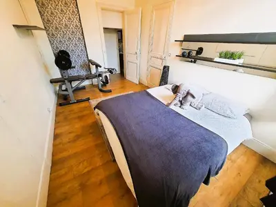 Un ou plusieurs lits dans un hébergement de l'établissement Le Fontenelle Appartement hyper centre par beds76