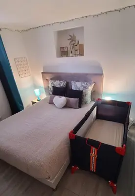 Un ou plusieurs lits dans un hébergement de l'établissement Appartement T2 confortable - ParisGetAway95