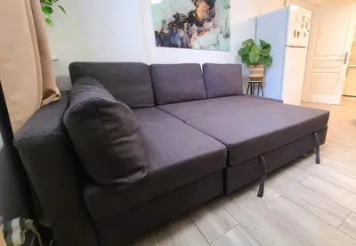 Coin salon dans l'établissement Appartement T2 confortable - ParisGetAway95
