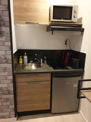 Cuisine ou kitchenette dans l'établissement STUDIO LE PETIT ATELIER - PROCHE GARE - WiFi