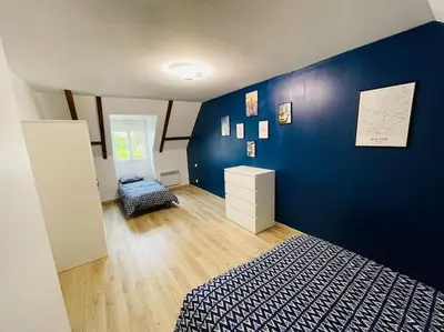 Un ou plusieurs lits dans un hébergement de l'établissement Villa avec piscine chauffée à moins 1h30 de Paris