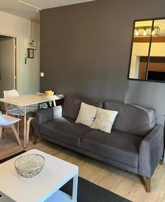 Coin salon dans l'établissement APPARTEMENT 190