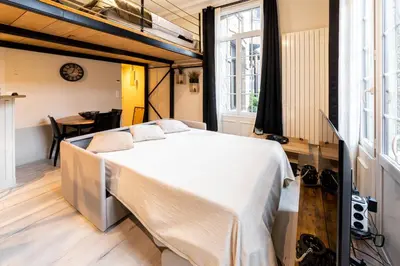 Un ou plusieurs lits dans un hébergement de l'établissement Le Château Senard, Studio cosy 23 m2 au calme proche gare - 3 min