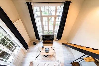Coin salon dans l'établissement Le Château Senard, Studio cosy 23 m2 au calme proche gare - 3 min