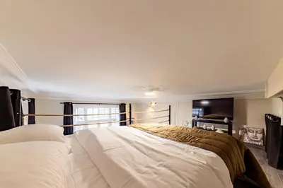 Un ou plusieurs lits dans un hébergement de l'établissement Le Château Senard, Studio cosy 23 m2 au calme proche gare - 3 min