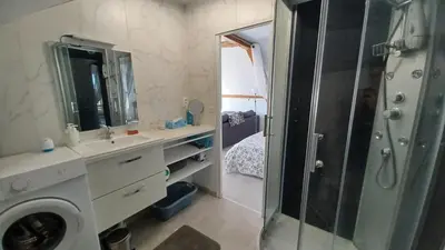 Salle de bains dans l'établissement L'appel de la foret