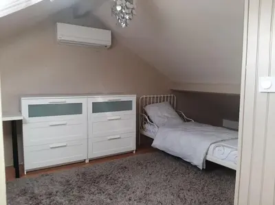 Un ou plusieurs lits dans un hébergement de l'établissement Maison Aubergenville Elisabethville