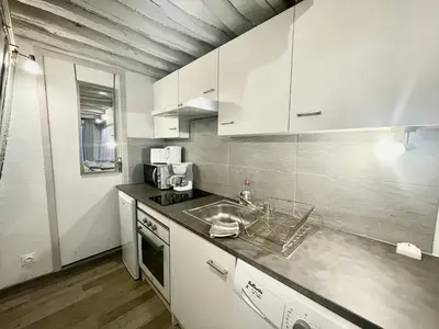 Cuisine ou kitchenette dans l'établissement petit studio près du centre - 186
