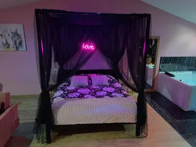 Un ou plusieurs lits dans un hébergement de l'établissement Loveroom - Les suites d'Élise - Suite Élise