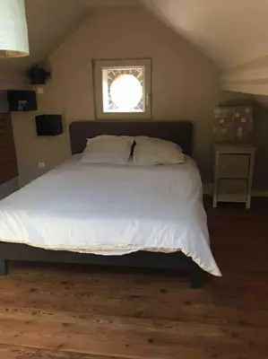 Un ou plusieurs lits dans un hébergement de l'établissement Belle maison dans un village de charme