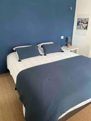 Un ou plusieurs lits dans un hébergement de l'établissement Belle maison dans un village de charme