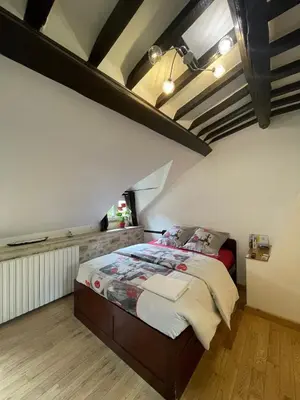 Un ou plusieurs lits dans un hébergement de l'établissement Chambre équipée Magnolia - 2 pers avec sdb wc privé