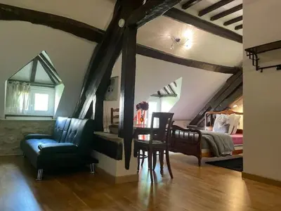 Coin salon dans l'établissement Appartement Héritage - 1 chambre 4 personnes
