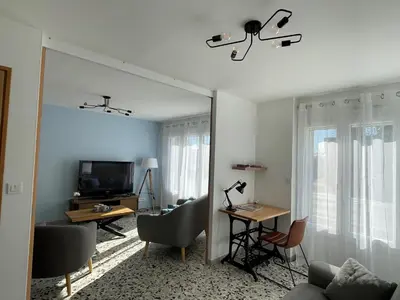 Télévision ou salle de divertissement dans l'établissement Gîte Le Pont du Rameur