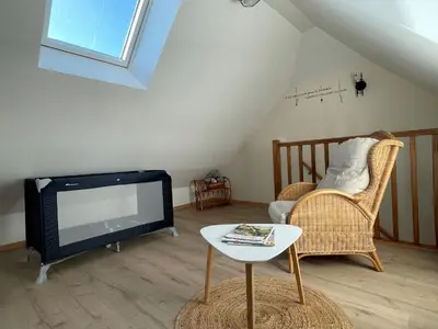 Coin salon dans l'établissement Gîte Au bord du Halage
