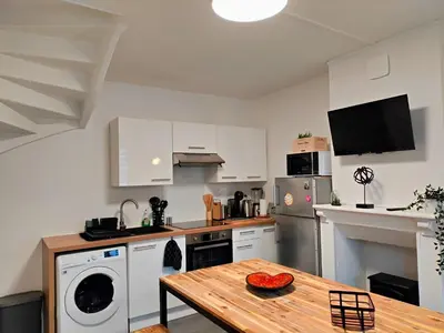 Cuisine ou kitchenette dans l'établissement Locanoor Dieppe - Maison de Pêcheur devenue Cosy