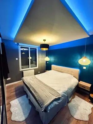 Un ou plusieurs lits dans un hébergement de l'établissement Escapade Relaxante - Spa - Jacuzzi - Sauna - Privés