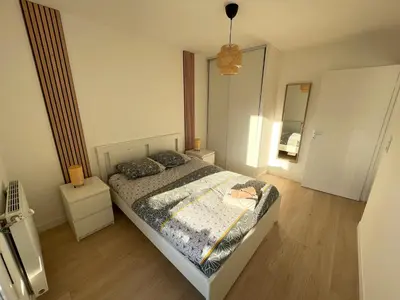 Un ou plusieurs lits dans un hébergement de l'établissement Bel appartement pour 6 avec parking - Rive gauche - 183