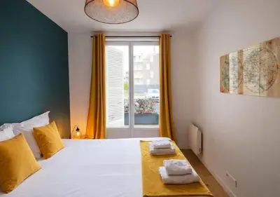 Un ou plusieurs lits dans un hébergement de l'établissement White House - THE SUNNY avec TERRASSE et PARKING privé - 20 min CENTRE