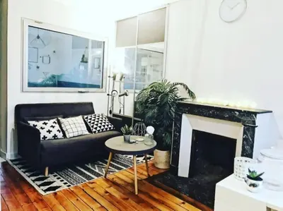 Coin salon dans l'établissement Appart/Loft hyper centre POISSY, RER : 2min à pied