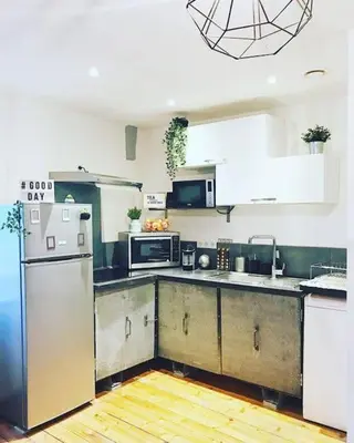 Cuisine ou kitchenette dans l'établissement Appart/Loft hyper centre POISSY, RER : 2min à pied