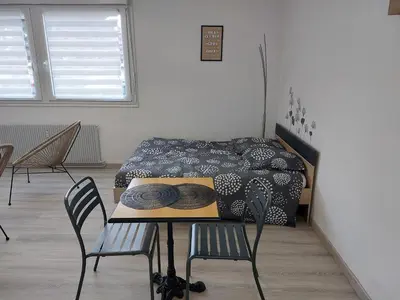 Coin salon dans l'établissement charmant studio proche du centre de neuville les dieppe