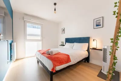 Un ou plusieurs lits dans un hébergement de l'établissement Seine View, Panorama & Résidence privée à Rouen
