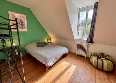 Un ou plusieurs lits dans un hébergement de l'établissement Le “Chez-nous” - Maison atypique de 90m2