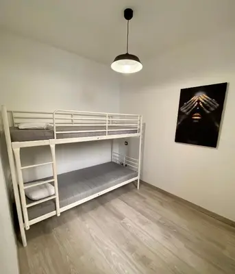 Un ou plusieurs lits dans un hébergement de l'établissement La Vague Tendresse - Vue mer - Jacuzzi & Sauna