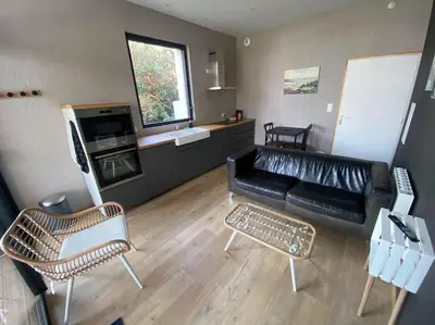 Coin salon dans l'établissement Parc Beausejour Aparthotel