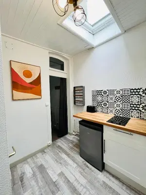 Cuisine ou kitchenette dans l'établissement L’escale proche centre ville