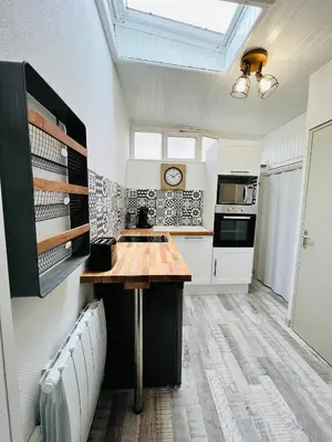 Cuisine ou kitchenette dans l'établissement L’escale proche centre ville