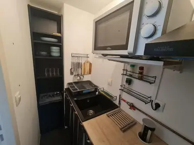 Cuisine ou kitchenette dans l'établissement Maison Cosy en Pleine Nature