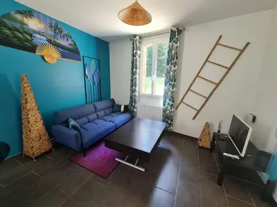 Coin salon dans l'établissement Maison Cosy en Pleine Nature