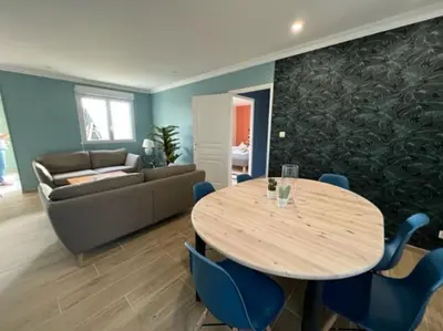 Coin salon dans l'établissement Maison Les Géraniums