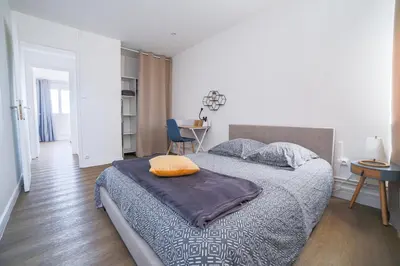 Un ou plusieurs lits dans un hébergement de l'établissement Oasis urbaine - proche centre-ville - garage