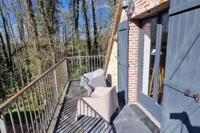 Balcon ou terrasse dans l'établissement Jardins de Mélusine - Maison en pierres